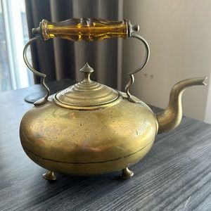 Antique brass kettle.